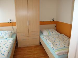 Ένα ή περισσότερα κρεβάτια σε δωμάτιο στο Ferienwohnung-Ketzin im OT Brückenkopf