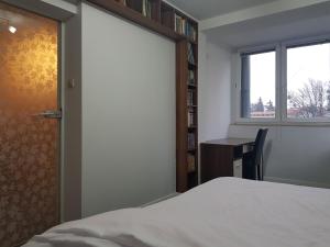 Posteľ alebo postele v izbe v ubytovaní Toruńska 6