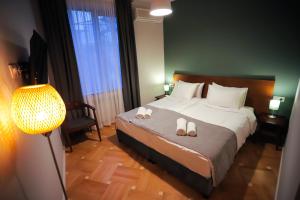 Postel nebo postele na pokoji v ubytování HOTEL SABU