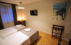 Postel nebo postele na pokoji v ubytování HOTEL SABU