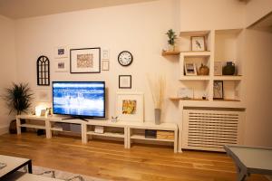 A television and/or entertainment center at BestStay Apartment No 9 Pedestrian zone