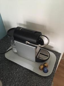 a black and silver appliance sitting on a counter at Niederfeld83 in Winterthur