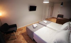 Postel nebo postele na pokoji v ubytování HOTEL SABU