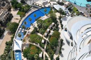 an aerial view of a resort with a pool at Address Downtown in Dubai
