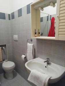 Ванная комната в A Due Passi Dal Mare