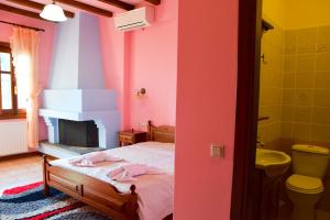 Postelja oz. postelje v sobi nastanitve Aegean House