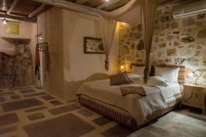 A bed or beds in a room at Stenosa