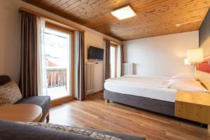 Postel nebo postele na pokoji v ubytování Meisser Lodge