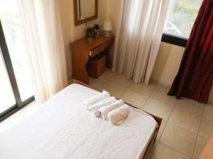 Postel nebo postele na pokoji v ubytování PETRA MARE VILLA
