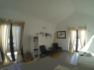 Postel nebo postele na pokoji v ubytování Studio Luna