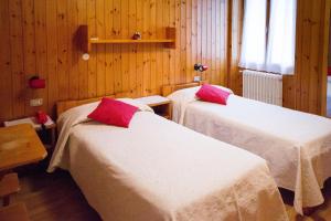 Meublé Albergo Dante客房内的一张或多张床位