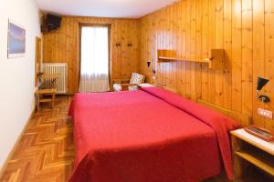 Meublé Albergo Dante客房内的一张或多张床位