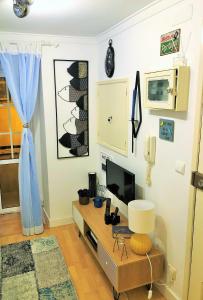 TV/trung tâm giải trí tại Blue Urban Alfama