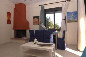 Posezení v ubytování PETRA MARE VILLA + 37 fotografií