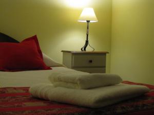 Una cama o camas en una habitación de Portal de La Cumbre