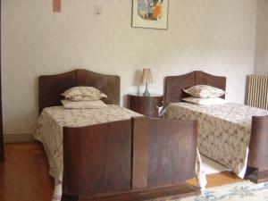 - 2 lits dans une pièce dans l'établissement Casa Da Espinhosa, à Guimarães