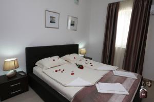 Cama ou camas em um quarto em Villa Andjelina