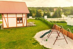 Herní místnost nebo prostor pro děti v ubytování Kubiczówka