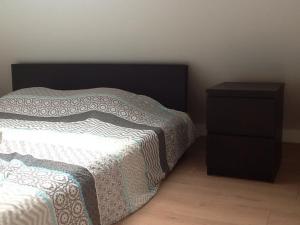 Postel nebo postele na pokoji v ubytování Akker duplex