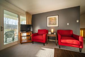 TV a/nebo společenská místnost v ubytování Sun & Ski Inn and Suites