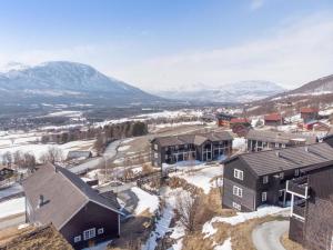 an aerial view of a village in the snow at Oppdal Alpintun, Stølen øvre - ski in ski out in Oppdal