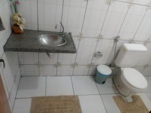 Bilik mandi di Casa Temporada com Ar cond e Wifi +26 gambar