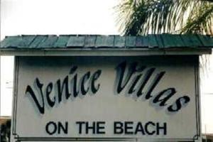 a sign for awhile villas on the beach at Venice Villas on the Beach in Venice