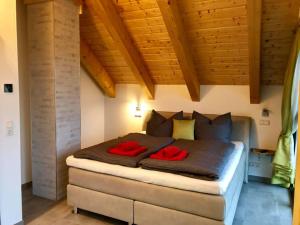 Postel nebo postele na pokoji v ubytování Naturstammhaus und Appartements Zum Brockenbaecker