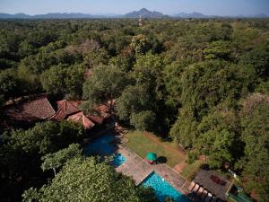 an aerial view of a house with a swimming pool at Hotel Sigiriya in Sigiriya