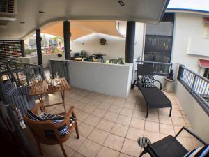 A restaurant or other place to eat at Penthouse Apartment, 7 Beach Road, Coolum Beach