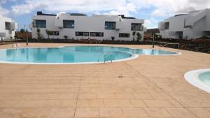 The swimming pool at or close to Marta & Lorenzo Apartment. Fuerteventura