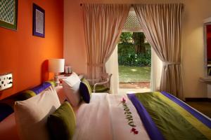 Postelja oz. postelje v sobi nastanitve Hotel Sigiriya