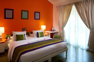 Postelja oz. postelje v sobi nastanitve Hotel Sigiriya