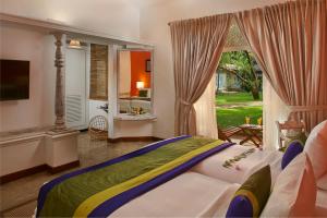 Postelja oz. postelje v sobi nastanitve Hotel Sigiriya