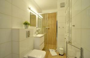 Kúpeľňa v ubytovaní Apart-Invest Apartament Oslo + 14 fotografií