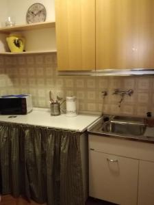 Kuchyň nebo kuchyňský kout v ubytování Giuly Home