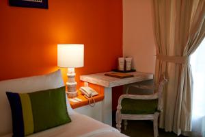 Postelja oz. postelje v sobi nastanitve Hotel Sigiriya