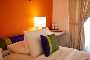 Postelja oz. postelje v sobi nastanitve Hotel Sigiriya