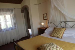 Voodi või voodid majutusasutuse Agriturismo Poggio de Papi toas