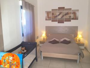 Postel nebo postele na pokoji v ubytování L'ESCALE COTE BLEUE B&B AND Spa