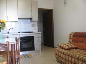 A kitchen or kitchenette at La Sorgente Del Subasio ASSISI