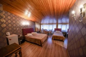 Postel nebo postele na pokoji v ubytování Kosk Hotel Kadikoy