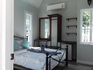 Postel nebo postele na pokoji v ubytování Sky cottage Bungalow