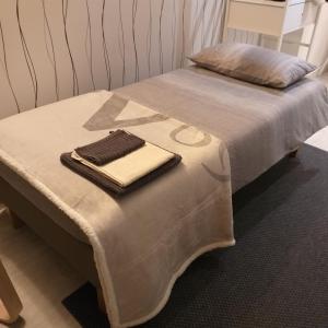 Posteľ alebo postele v izbe v ubytovaní Adam Apartment