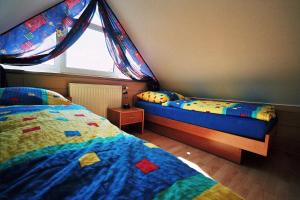 Ein Bett oder Betten in einem Zimmer der Unterkunft Apartment Schmitz