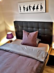 Postel nebo postele na pokoji v ubytování Churchstreet appartements + 35 fotografií