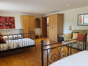 Voodi või voodid majutusasutuse The Old Granary Country-retreat toas