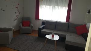Uma área de estar em Apartma Sebastjan Dobova near Terme Paradiso