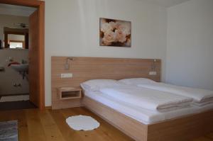 Posteľ alebo postele v izbe v ubytovaní Apartments Bachmann