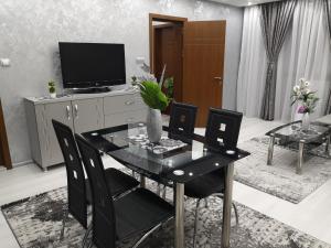 Μια τηλεόραση ή/και κέντρο ψυχαγωγίας στο City Apartments - a brand new luxury & comfy. +17 φωτογραφίες